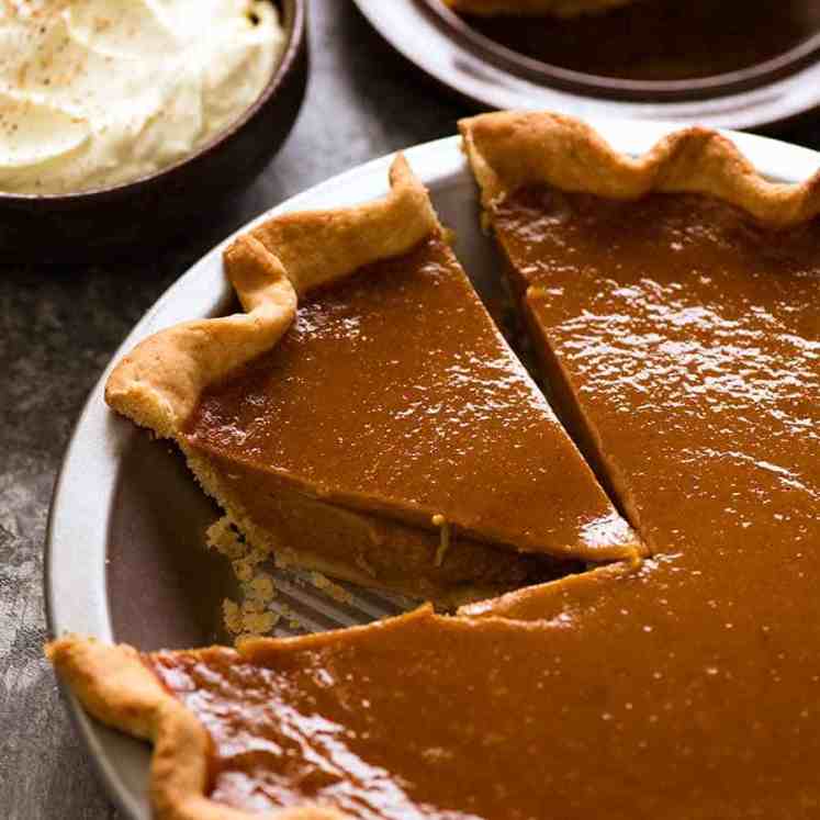 The BEST Pumpkin Pie, perfect in everyday with a beautiful smooth filling, crack free surface and flaky buttery pie crust